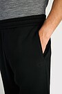 Oversized cotton fleece sweatpants 3 | BLACK | Audimas